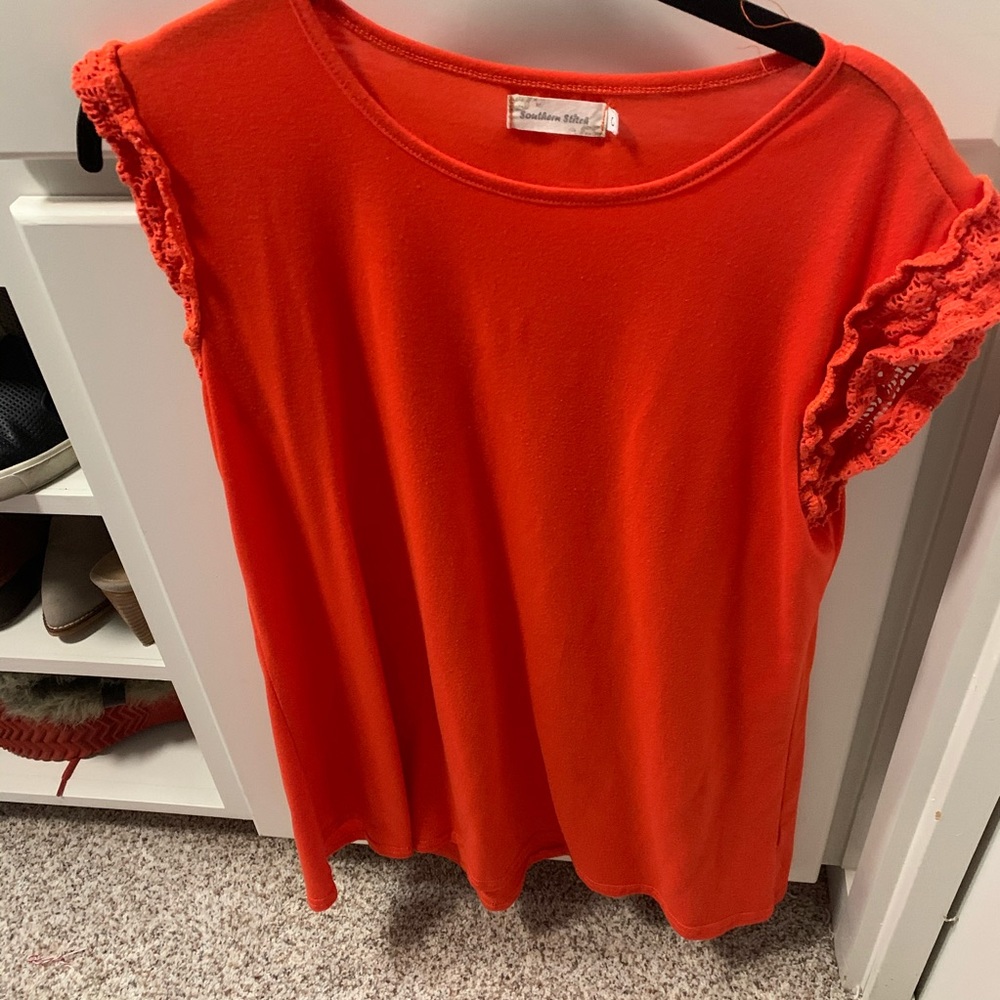 Orange ruffle top